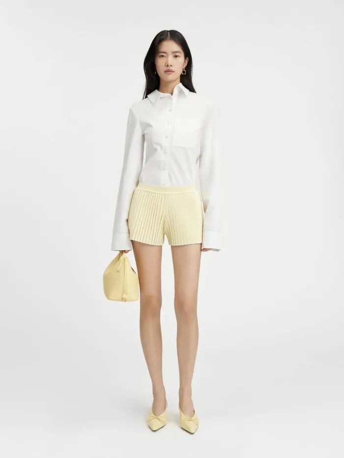 Women Trousers and Shorts JACQUEMUS The Pleated Knit Shorts Light Yellow