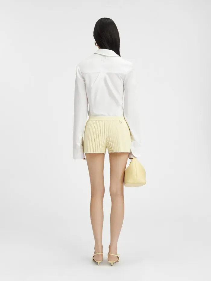 Women Trousers and Shorts JACQUEMUS The Pleated Knit Shorts Light Yellow